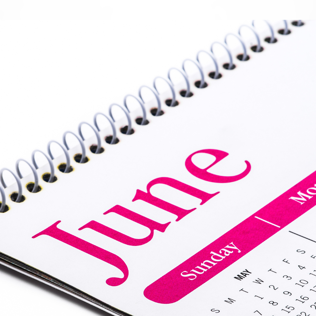 Calendar page showing June with a pink heading on a white background