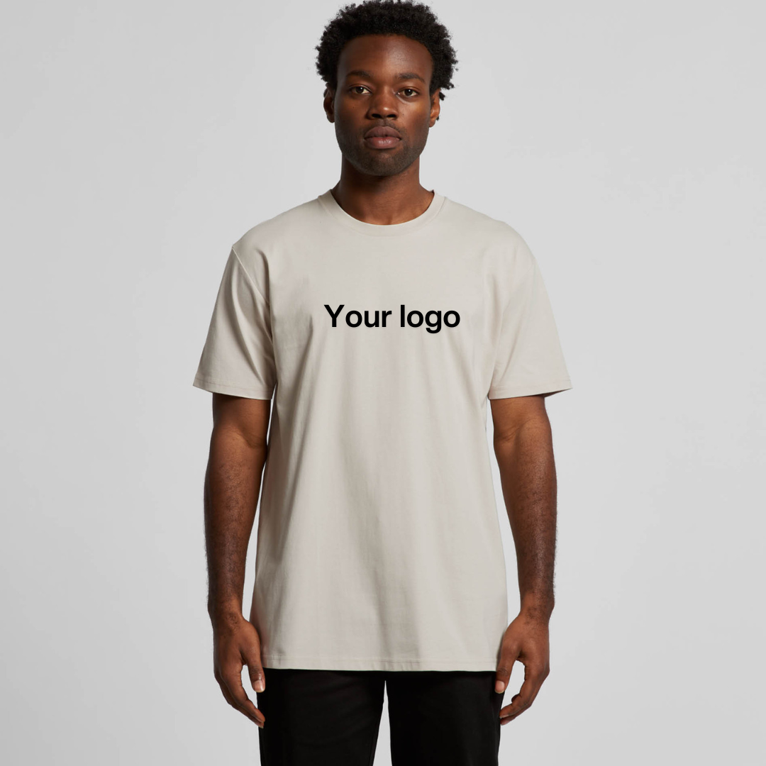 Man wearing a bone coloured T-Shirt with Your logo printed on it. 