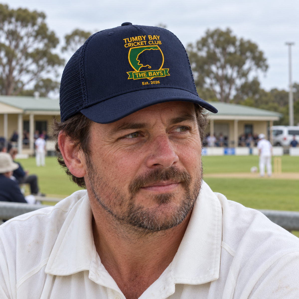 Tumby Bay Cricket Club navy trucker cap being worn at the cricket