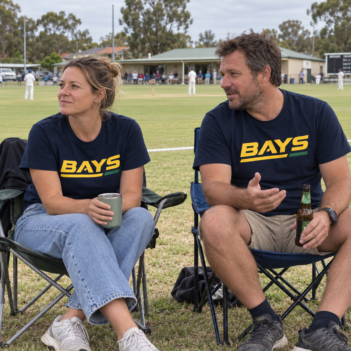 Supporters wearing the navy BAYS T-shirt at the cricket